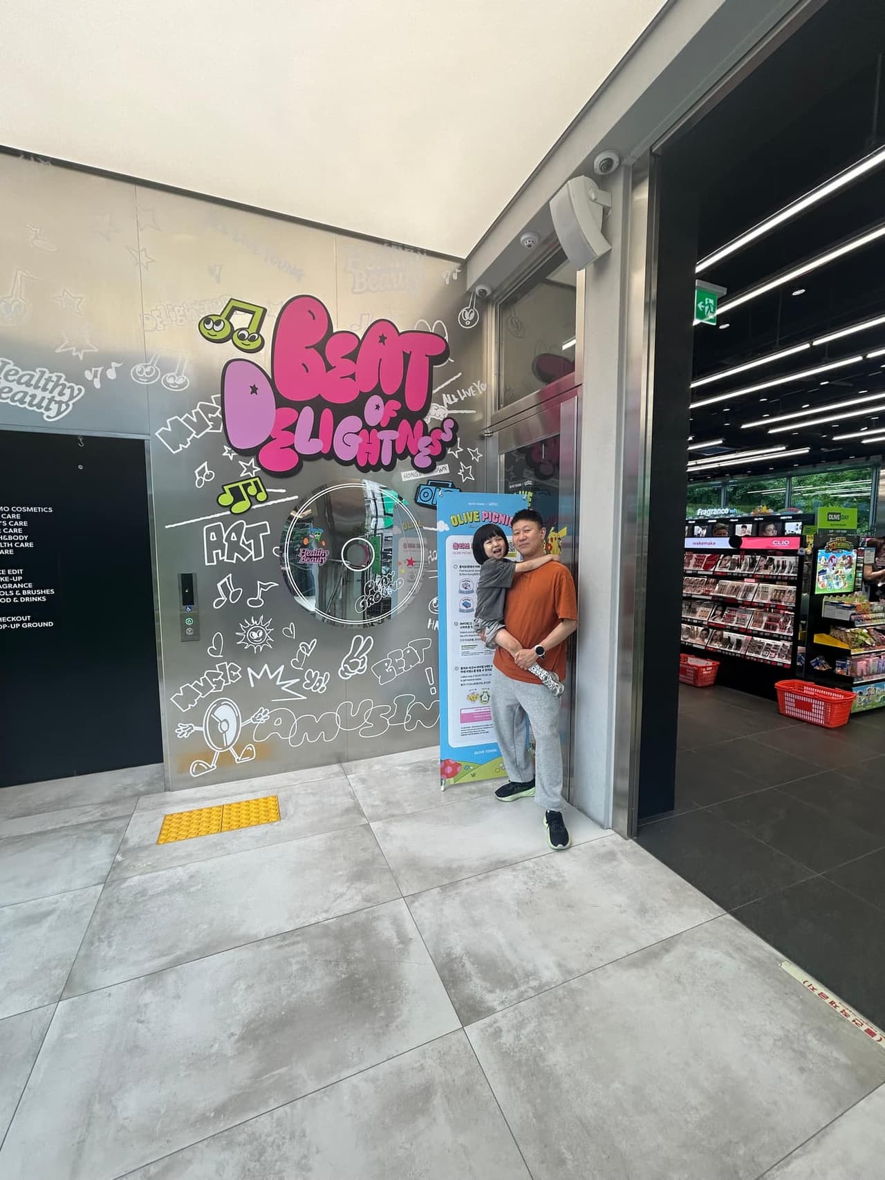 Entrance area and first-floor display inside Olive Young Hongdae Town