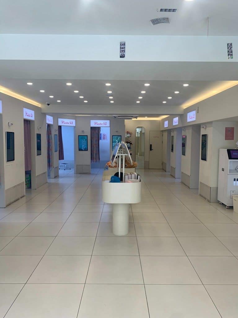 Life4Cuts Hongdae hallway with multiple numbered photo booths